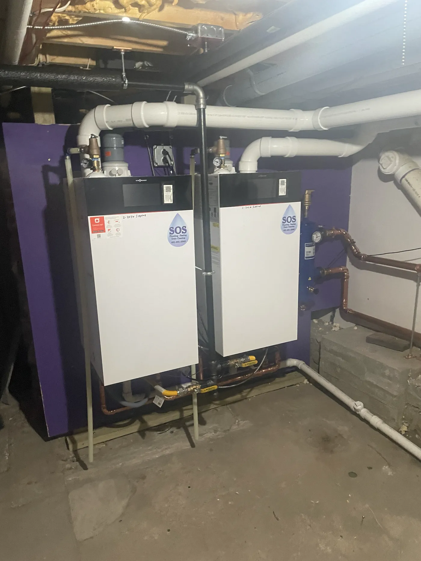 Two Viessmann wall-hung condensing boilers installed by SOS in a Rhode Island basement