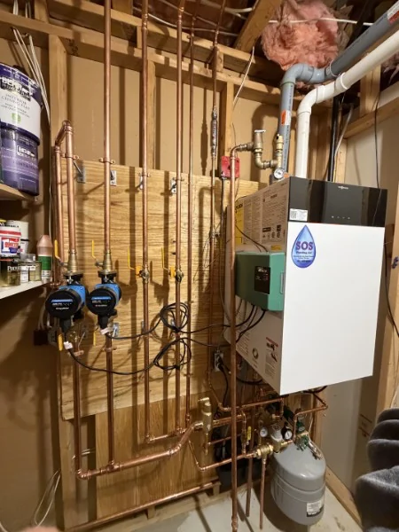 Wall-hung Viessmann condensing boiler installed by SOS in a Rhode Island home